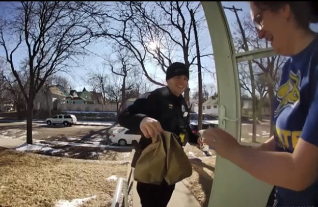 Police Officer delivering meal to a person